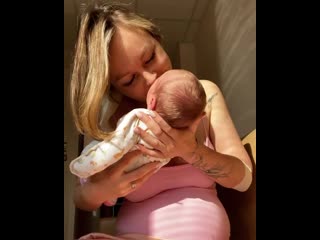 nastya lisova with her newborn daughter